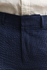 Pantalones de traje en sirsaca a&ntilde;il