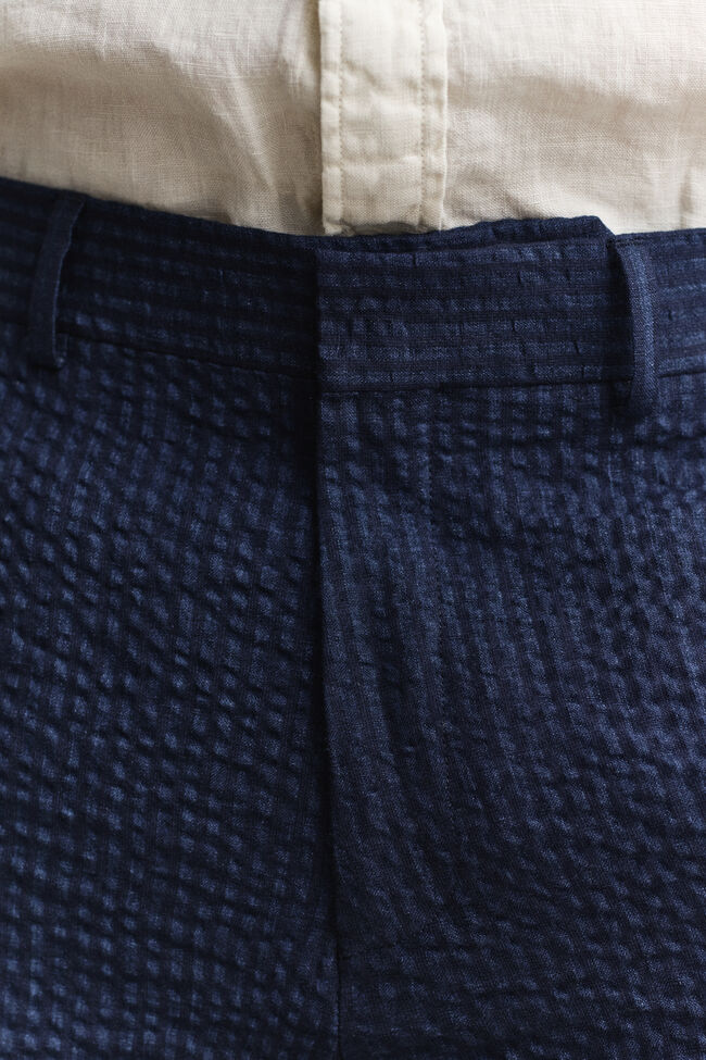 Pantalones de traje en sirsaca a&ntilde;il